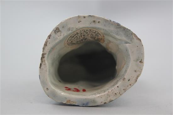 A Prattware figure of a young boy leaning on a barrel, late 18th century, 11.8cm